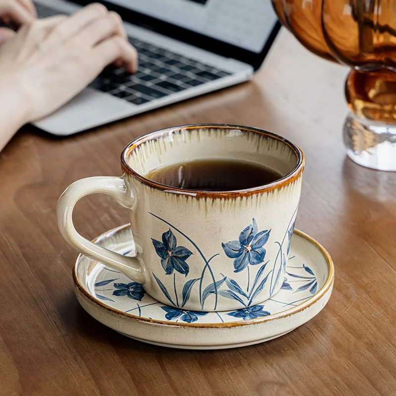 Blue 'snowflake-water wave v-shaped cup and saucer
