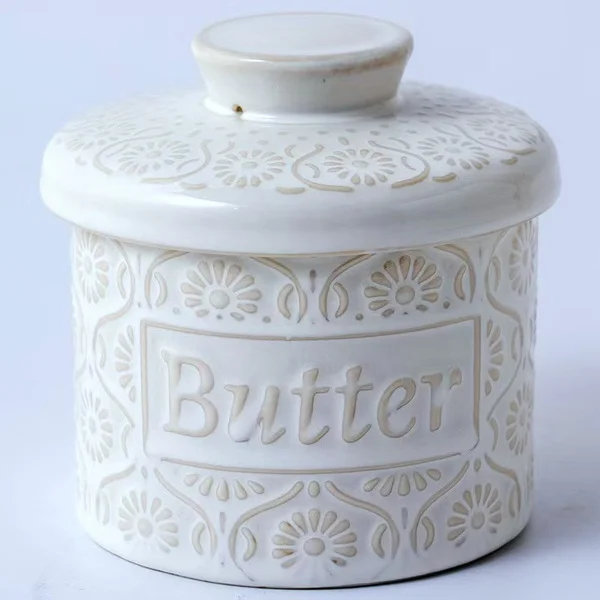 Kiln turned white butter jar